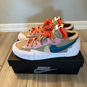 KAWS x Sacai Nike Blazer Low “Reed”